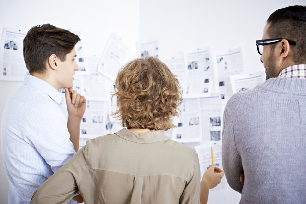 Three-People-Brainstorming Three-People-Brainstorming